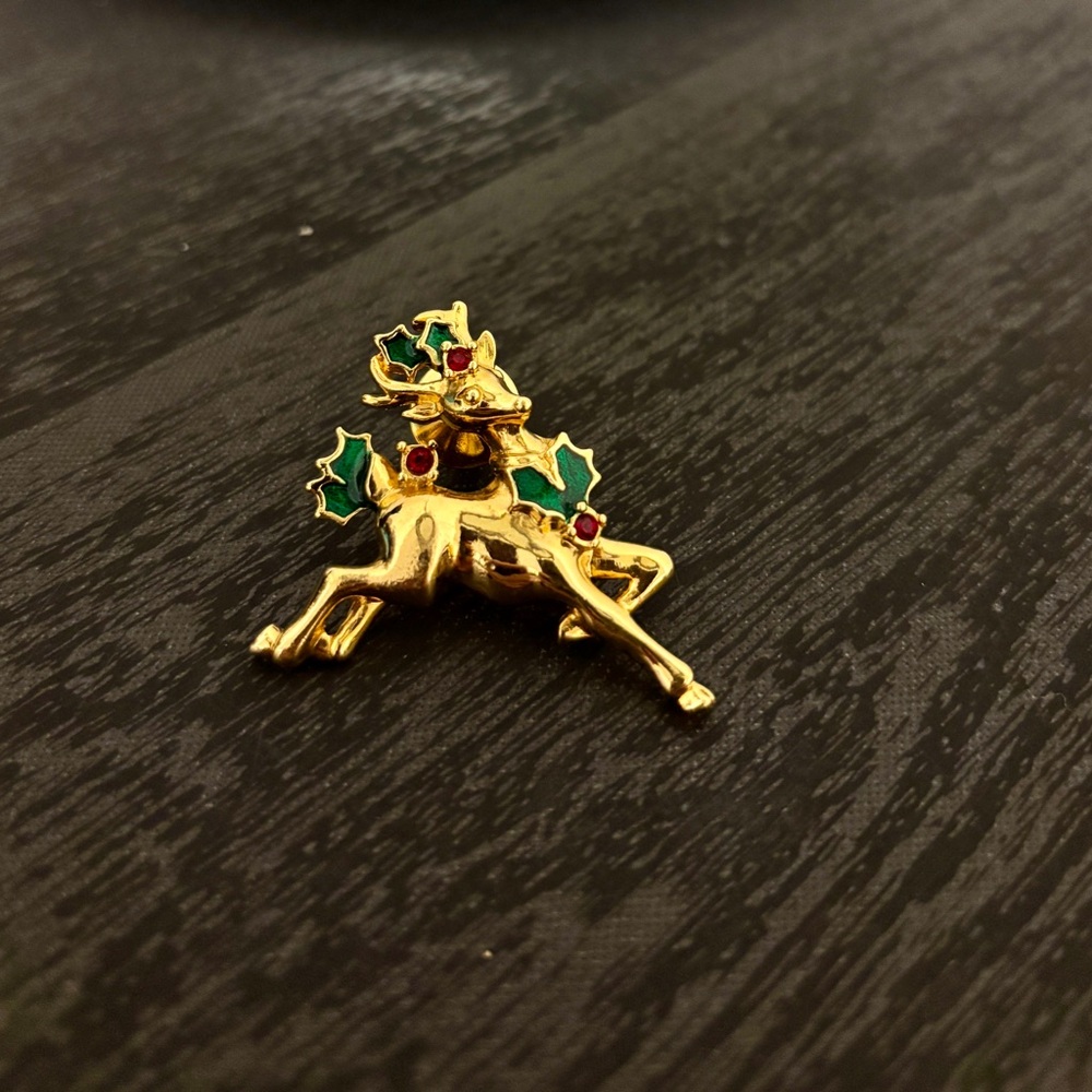 Avon Gold Reindeer Brooch with Green and Red Accents